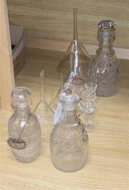 Three glass decanters and other glassware